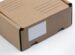 brown cardboard box on white table